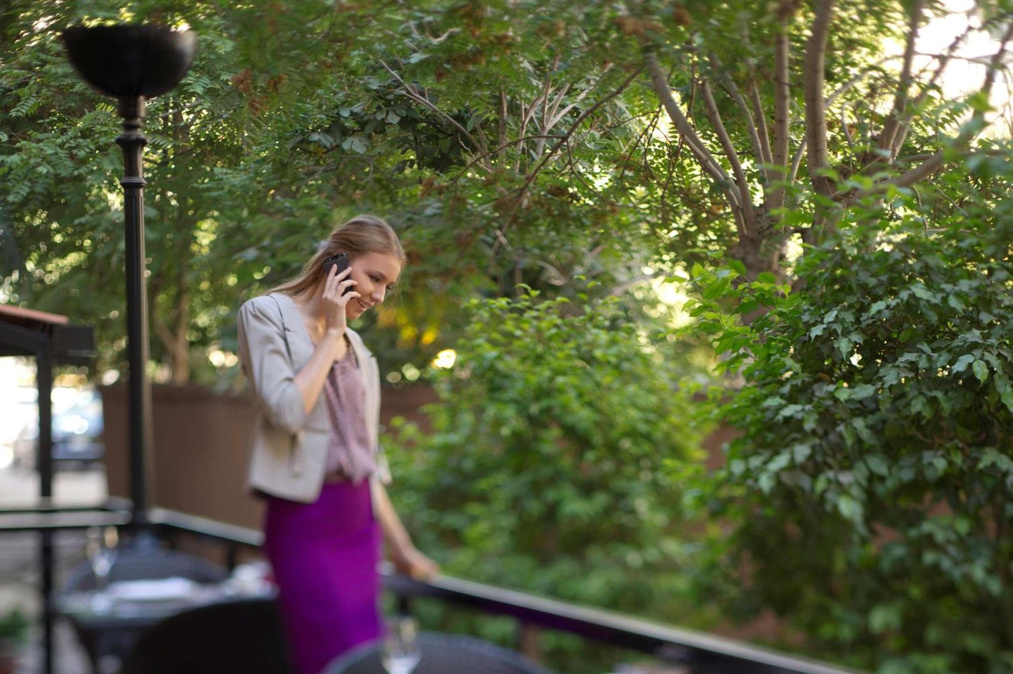 Radisson Blu Martinez Beirut Hotel Екстериор снимка A woman on a mobile phone